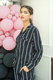 Chic and comfortable, the Black Stripe Flair Women's Button Down Shirt Pajama Set is great for lounging.