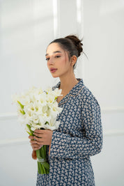 Enjoy ultimate comfort in the Blossom in Blue Relaxed Fit Button Down Pajama Set, perfect for bedtime.