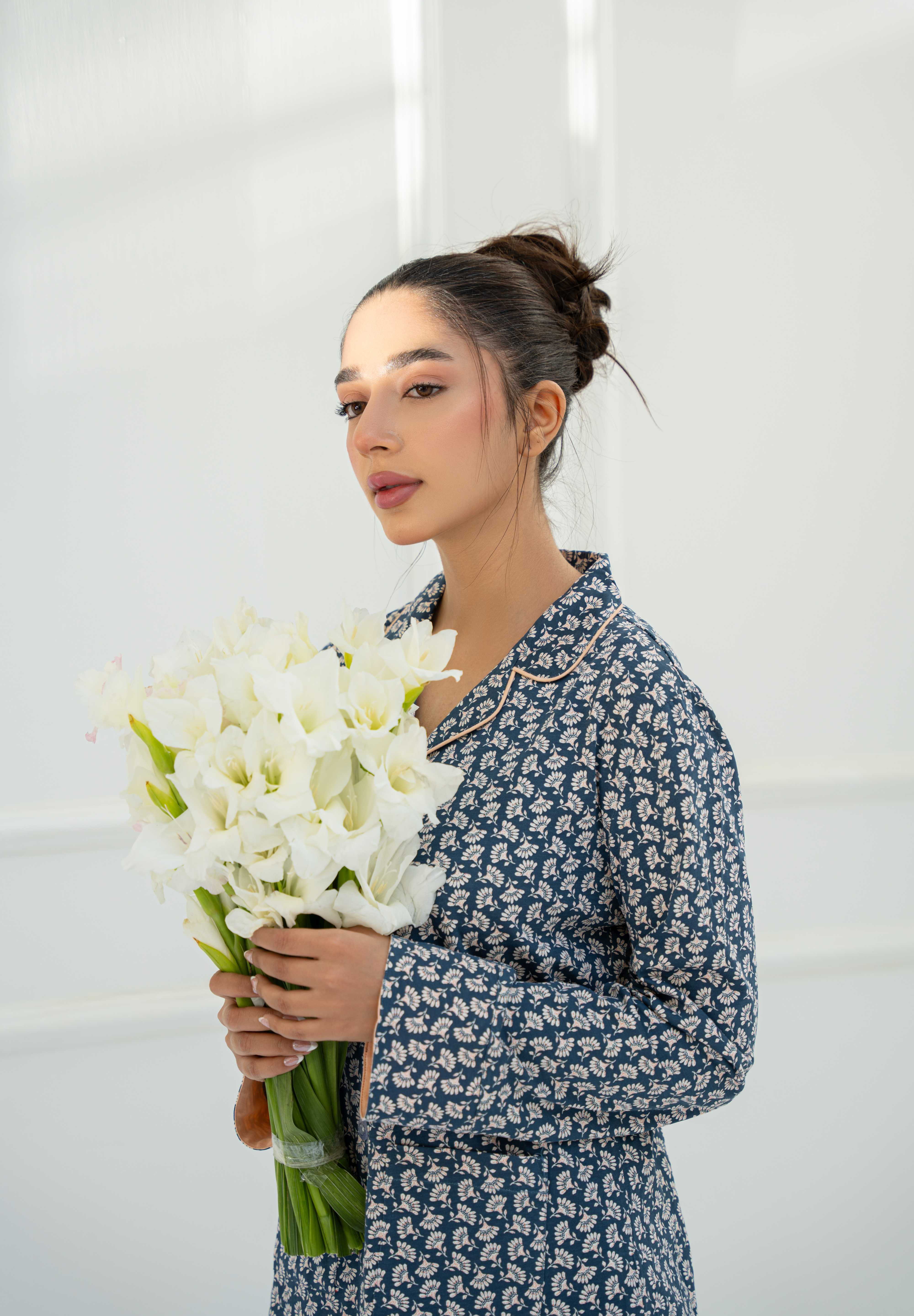 Enjoy ultimate comfort in the Blossom in Blue Relaxed Fit Button Down Pajama Set, perfect for bedtime.