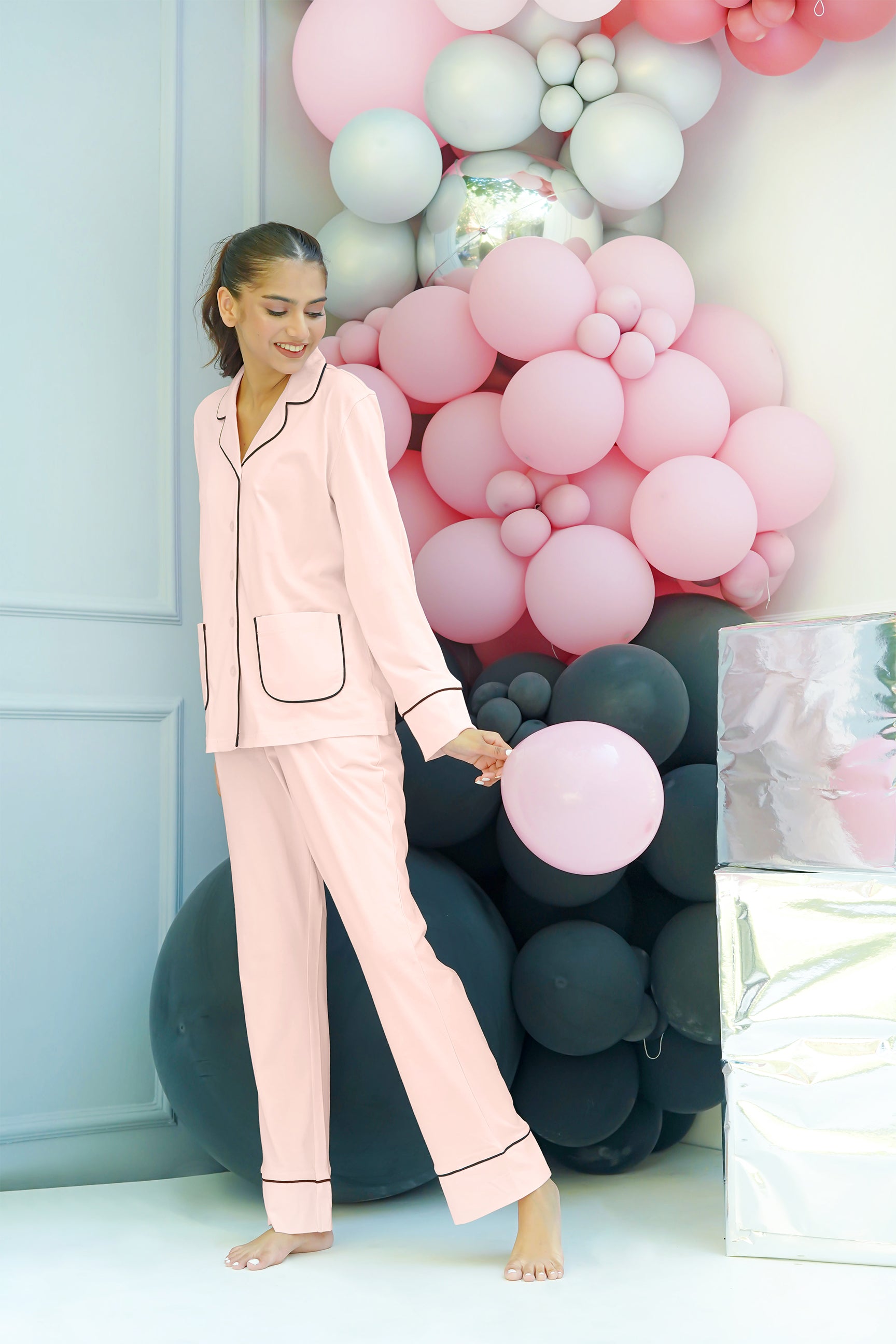 Relax in the Blush Button Down Pajamas for Women, designed for all-night comfort with a stylish touch.