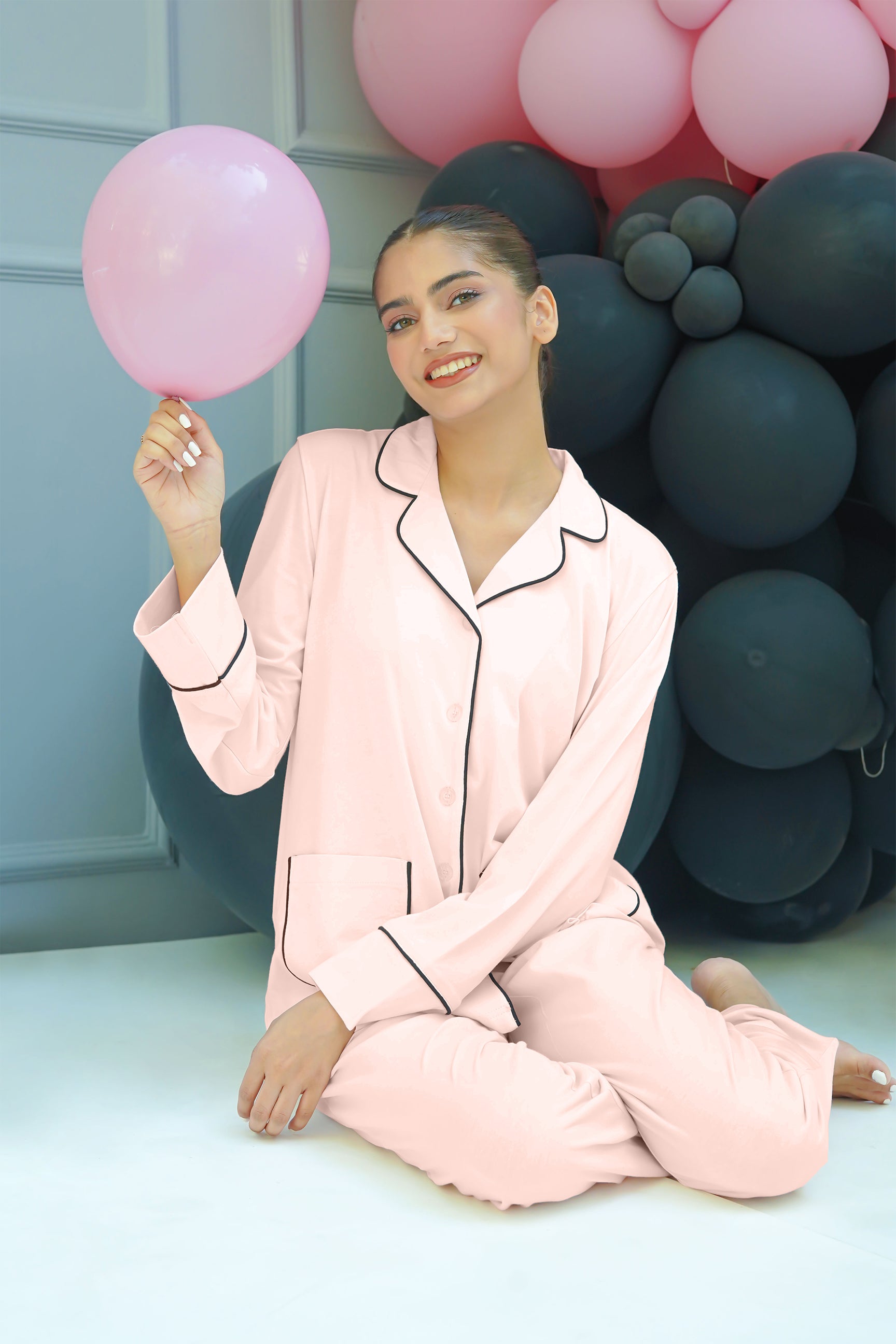 Stay comfortable in the Blush Cozy Button Down Shirt for Women, featuring a relaxed and breathable fabric.