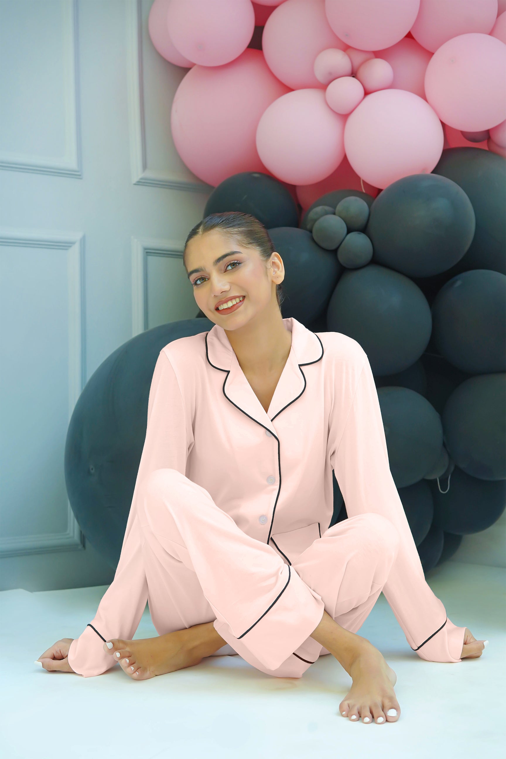 The Blush Women's Button Down Shirt Pajama Set blends classic style with soft fabric for everyday comfort.