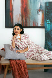 Designed for ultimate comfort, the Coral Blush Breathable Button Down Pajamas for Women ensure a restful and stylish sleep.