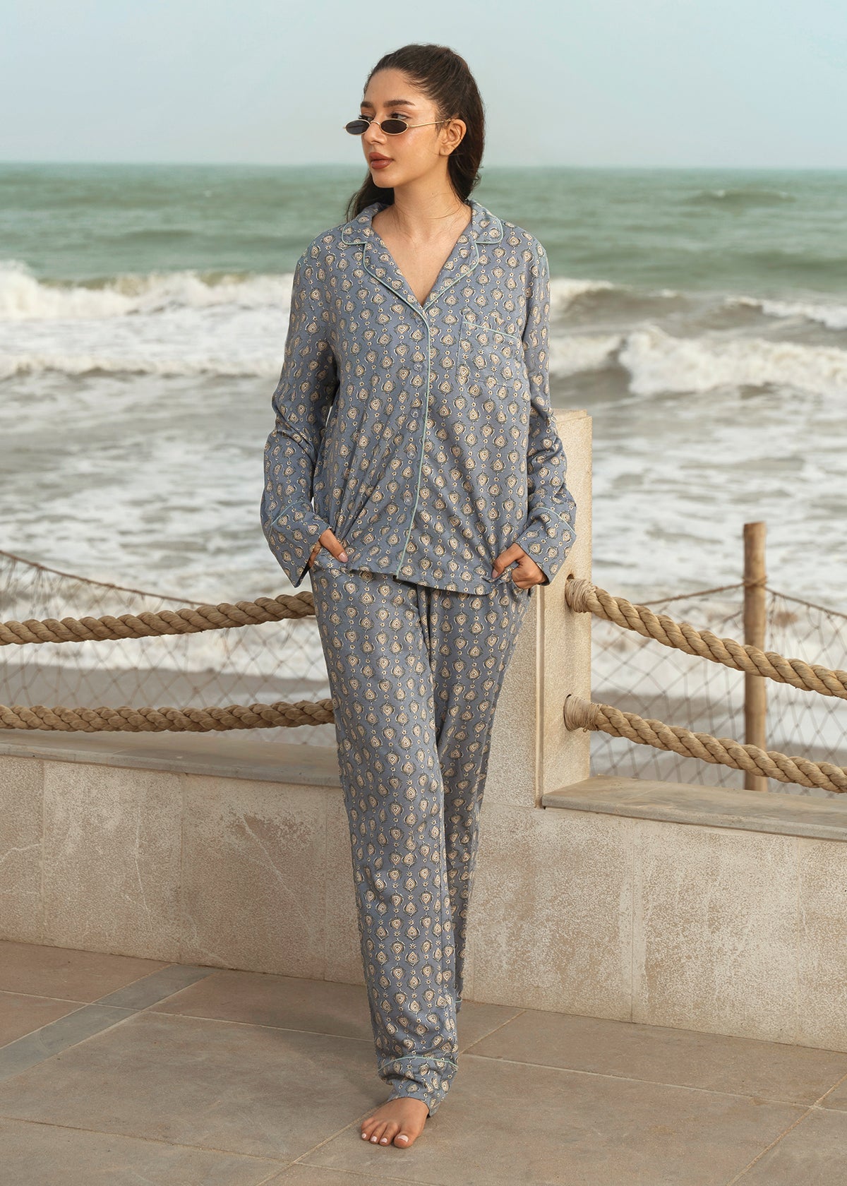 The Country Air Women's Button Down Pajama Set offers a relaxed fit and breathable fabric, perfect for a cozy night's sleep.