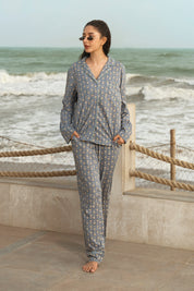 The Country Air Women's Button Down Pajama Set offers a relaxed fit and breathable fabric, perfect for a cozy night's sleep.