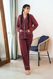 The Crimson Koi Button Down Pajamas for Women provide breathable comfort and a stylish button-up design.