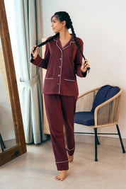 The Crimson Koi Women's Button Down Pajama Set offers a relaxed fit and soft fabric for cozy nights.