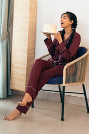 The Crimson Koi Women's Button Down Shirt Pajama Set blends comfort with a timeless and elegant design.