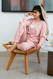 Enjoy restful nights with the Dune Blossom Pajama Set for Women, made with soft and airy material.