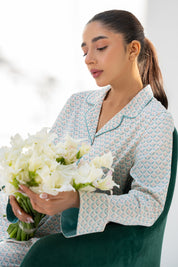 Lightweight and breathable, the Elegant Geometry Soft Fabric Button Down Pajamas offer all-night comfort.