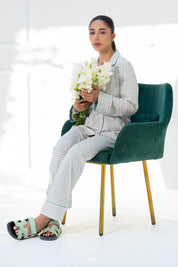 The Elegant Geometry Women's Button Down PJ Set features a classic design for bedtime and lounging.
