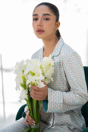 A perfect blend of style and comfort, the Elegant Geometry Women's Button Down Shirt Pajama Set.