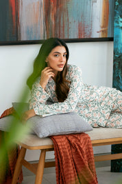 Featuring a lightweight button-down shirt and matching pajama pants, the Gardenia Cozy Button Down Shirt for Women is a must-have for relaxation.