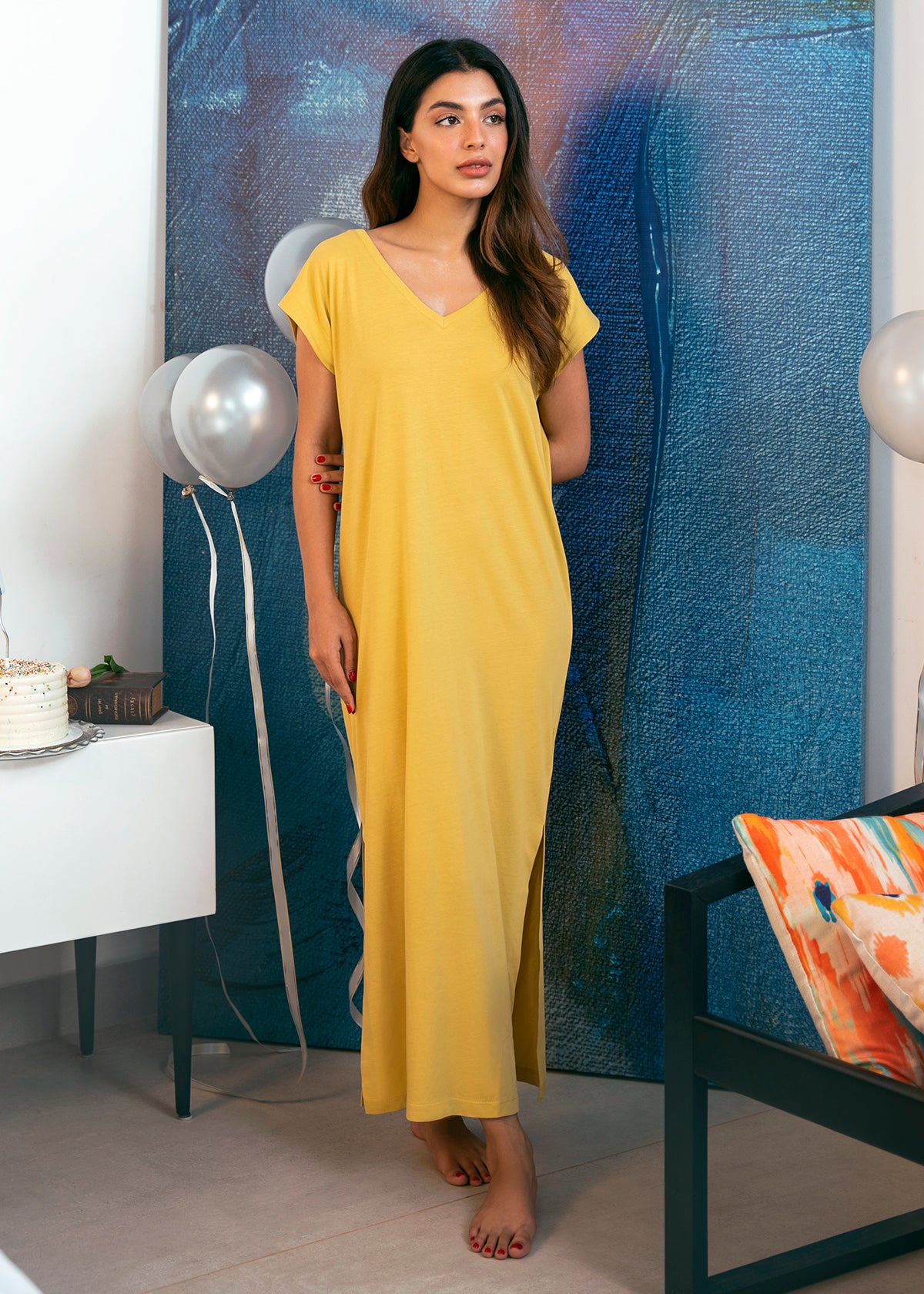 The Honey Cape Long Dress features a flowy silhouette, making it a great choice for elegant wear.