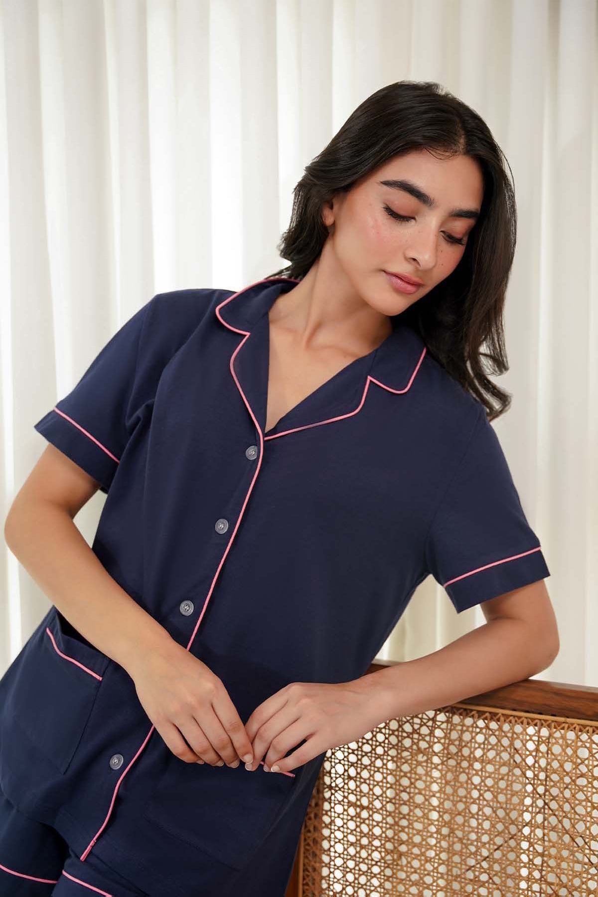 Stay cool in the Lucy Button Down Shorts Set for Women, featuring a breathable shirt and comfy shorts.