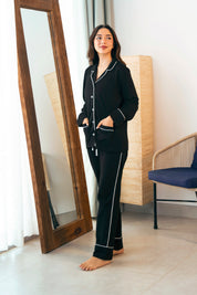 Sleep in comfort with the Midnight Star Button Down Pajamas for Women, made from breathable, soft fabric.