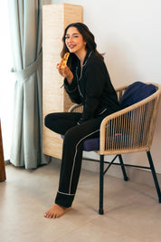 The Midnight Star Women's Button Down Shirt Pajama Set combines classic style with cozy comfort.