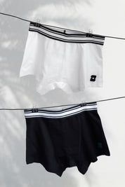Comfortable Pack of Two Men’s Boxers in Black and White, made from soft cotton.