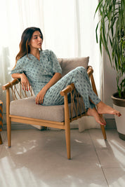 Stay comfortable with the Palm Oasis Button Down Pajamas for Women, designed with breathable fabric for all-night comfort.