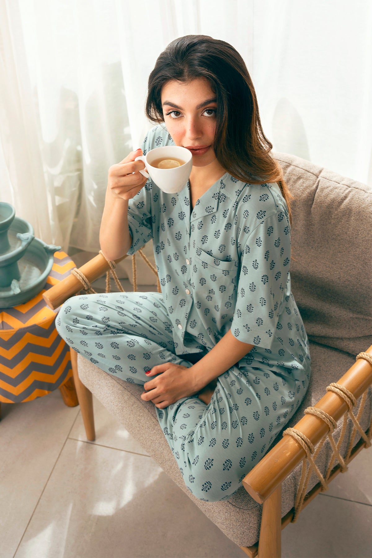 Featuring a soft button-down shirt and comfy bottoms, the Palm Oasis Cozy Button Down Shirt for Women is great for bedtime or lazy days.