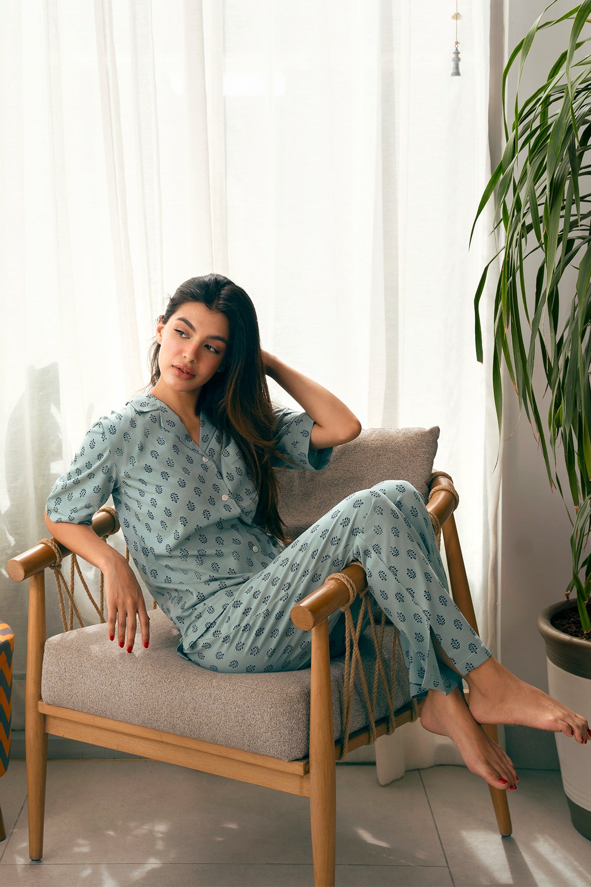 The Palm Oasis Stylish Women's Button Down PJ Set is perfect for lounging or sleeping in ultimate relaxation.