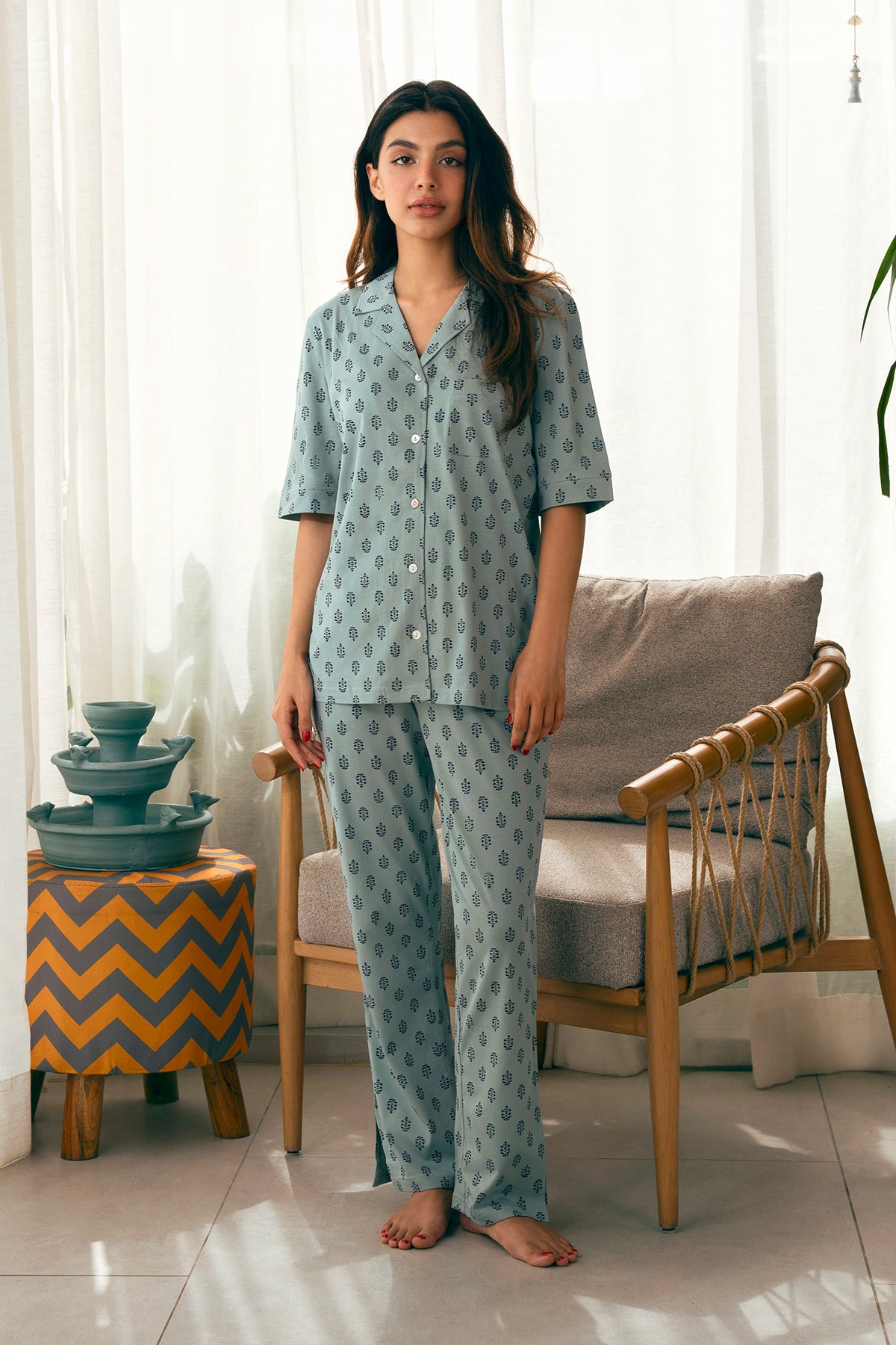The Palm Oasis Women's Button Down Pajama Set offers a relaxed fit with soft fabric for a cozy night's sleep.