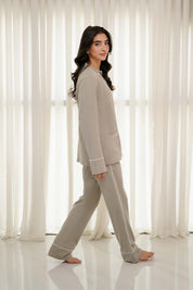 The Sarah Women's Button Down PJ Set features a classic button-down design with a soft and airy feel.