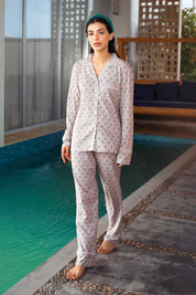 The Serene Shore Lightweight Women's Button Down PJ Set offers an airy feel, making it ideal for lounging or sleeping.