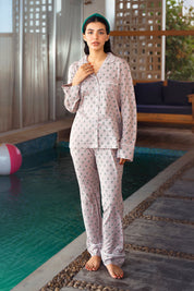The Serene Shore Women's Button Down Pajama Set features a soft and breathable design, perfect for restful nights.