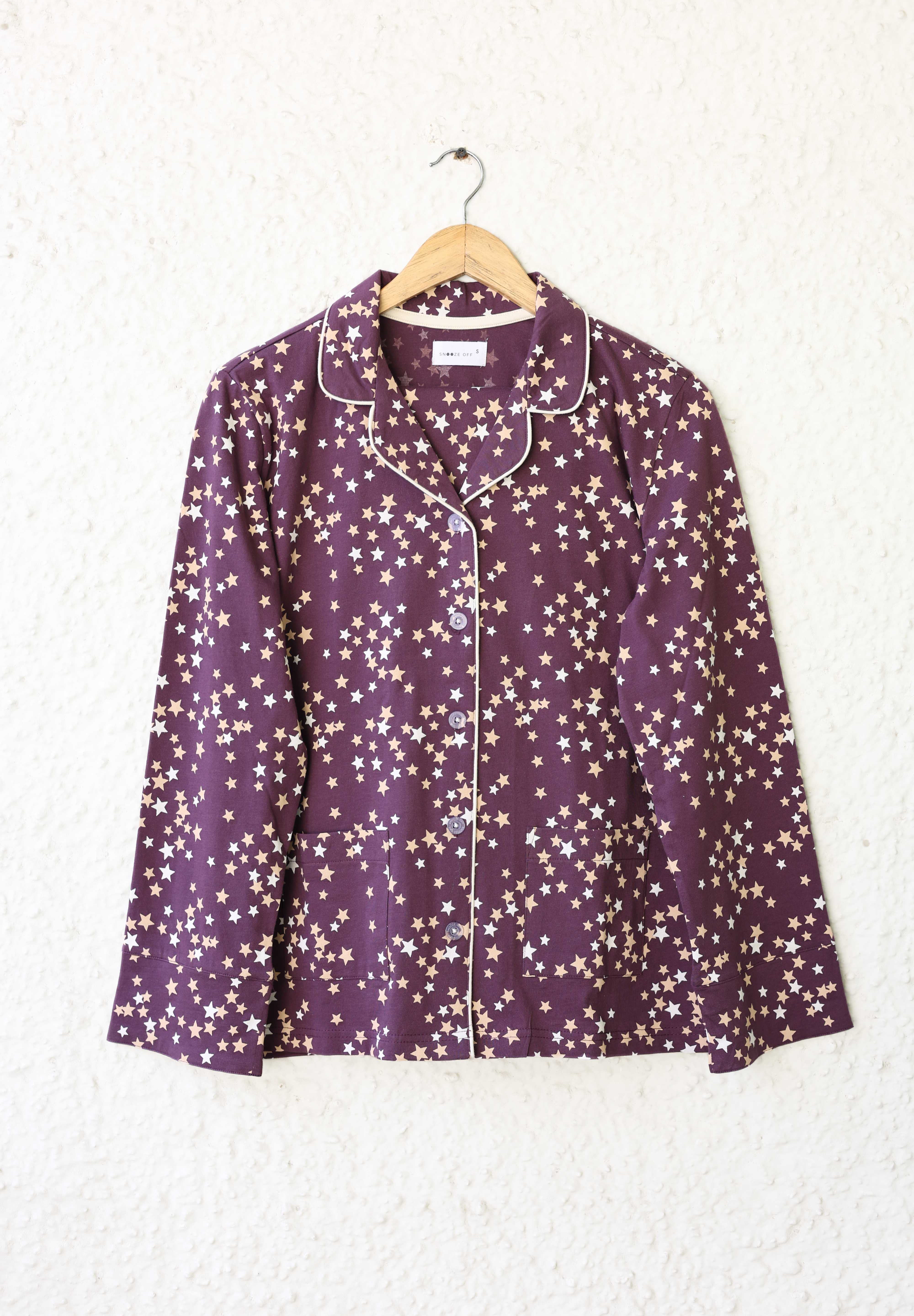 Soft and cozy Under the Stars Berry Women's Button Down Pajama Set, perfect for lounging and sleeping.
