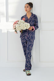 Relax in the Under the Stars Navy Button Down Pajamas for Women, perfect for lounging and bedtime.