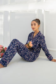 The Under the Stars Navy Soft Fabric Button Down Pajamas offer a relaxed fit with smooth, airy fabric.