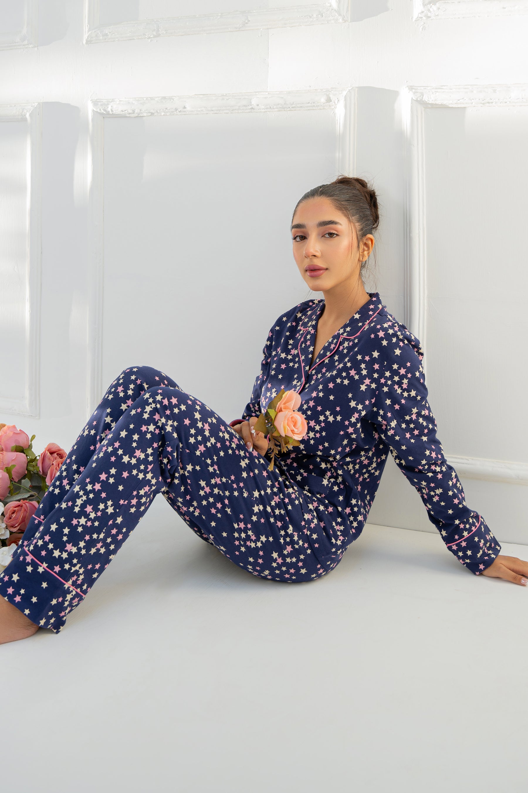 The Under the Stars Navy Soft Fabric Button Down Pajamas offer a relaxed fit with smooth, airy fabric.