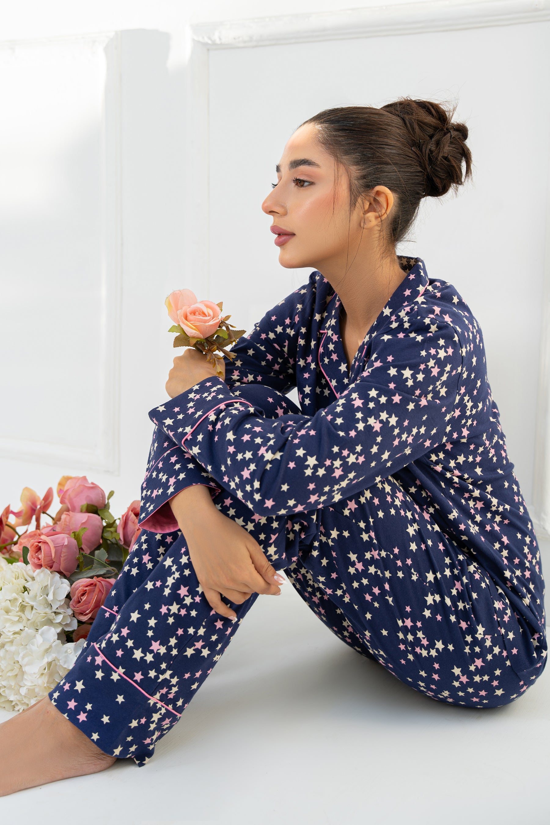 Classic and stylish, the Under the Stars Navy Women's Button Down Shirt Pajama Set is a must-have.