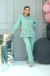 Enjoy a peaceful night in the Whispering Green Cozy Button Down Shirt for Women with soft, breathable fabric.