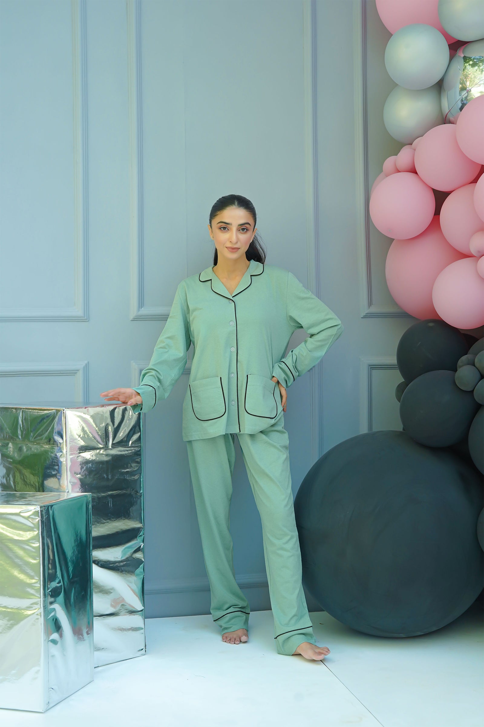 The Whispering Green Soft Fabric Button Down Pajamas provide ultimate comfort and a timeless look.