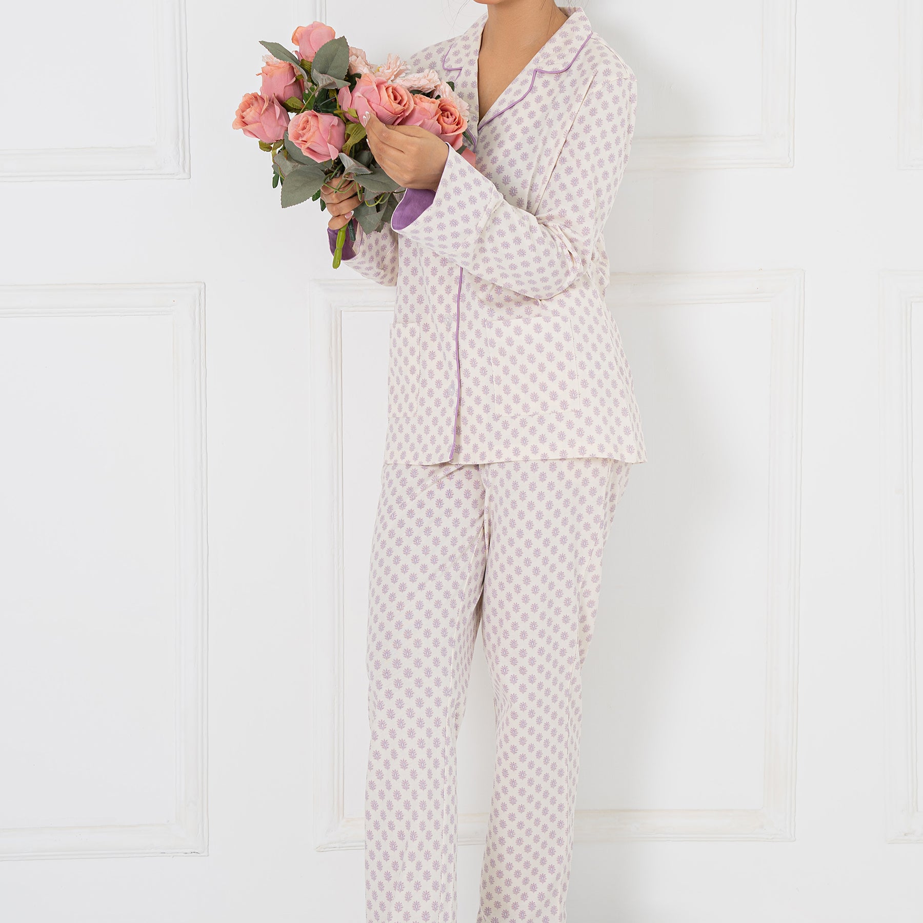 Soft and breathable Whispering Lilacs Women's Button Down Pajama Set in a soothing lilac shade.