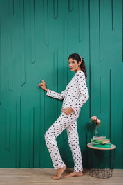 Lounge in the White Dotted Cozy Button Down Shirt for Women, made from soft and breathable fabric.
