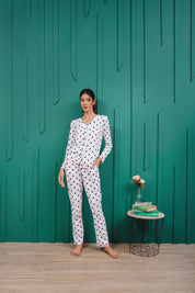 The White Dotted Women's Button Down PJ Set offers a lightweight feel with a timeless polka dot pattern.