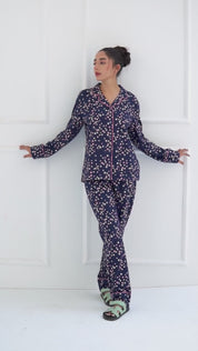 The Under the Stars (Navy) Elegant Women's Button Down Pajama Set blends softness with timeless style.